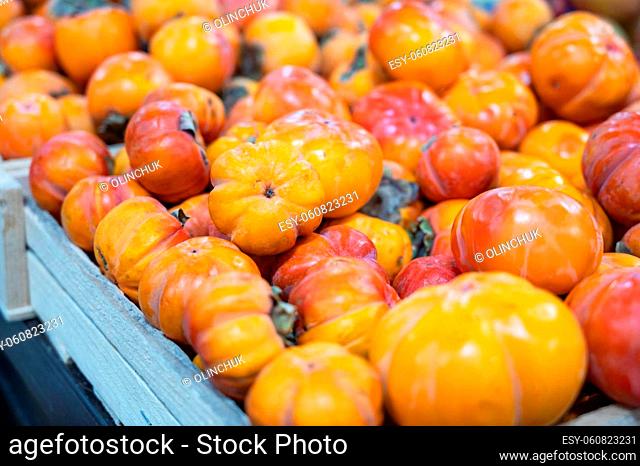 Persimmons fruit at the market