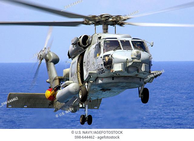 Pacific Ocean (May 19, 2006) - An SH-60B Seahawk assigned to the Saberhawks of Helicopter Anti-submarine Squadron Light Four Seven (HSL-47) prepares to land...