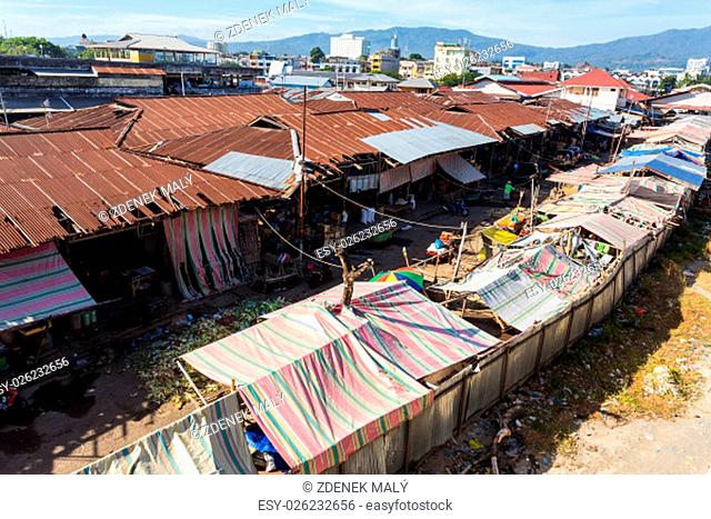 poor houses with sheet tin by the river, Kota Manado, North Sulawesi, Indonesia