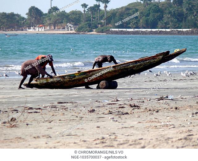 fishermen at the beach of The Gambia