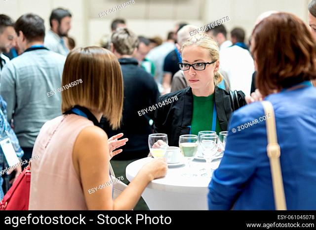Expert people interacting during coffee break at business, medical or scientific conference