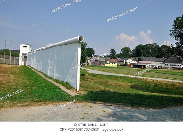 The former GDR border wall at the former Inner-German border between East and West Germany in Moedlareuth, central Germany, August 13, 2015