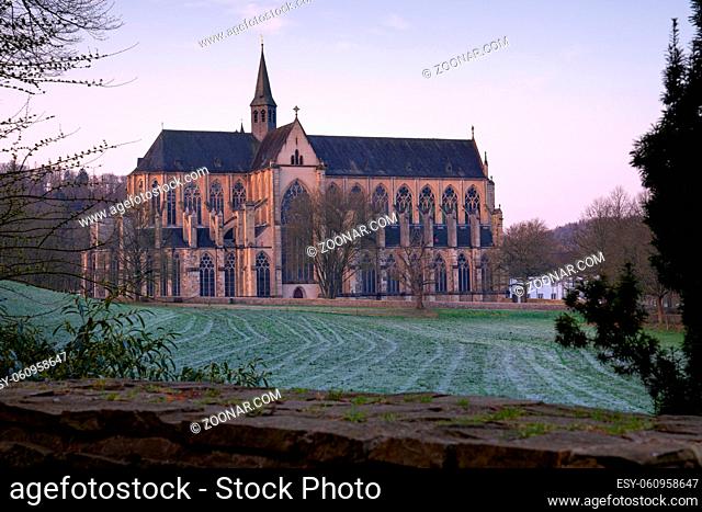 ODENTHAL, GERMANY - MARCH 27, 2020: Panoramic image of the Altenberg cathedral in morning light on March 27, 2020 in Germany