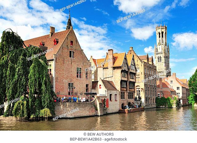 View of canal belfry and houses at Bruges Belgium