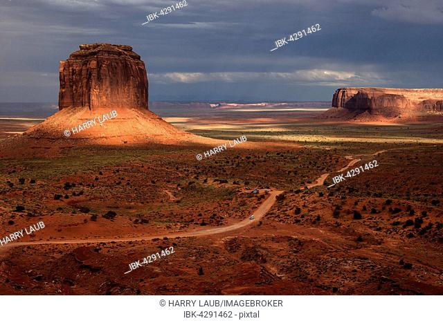 Rock formations, left Merrick Butte, Front Valley Drive, after storm, clouds, evening light, Monument Valley Navajo Tribal Park, Arizona, USA