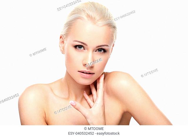 Young blond lady with a beautiful hair on white background