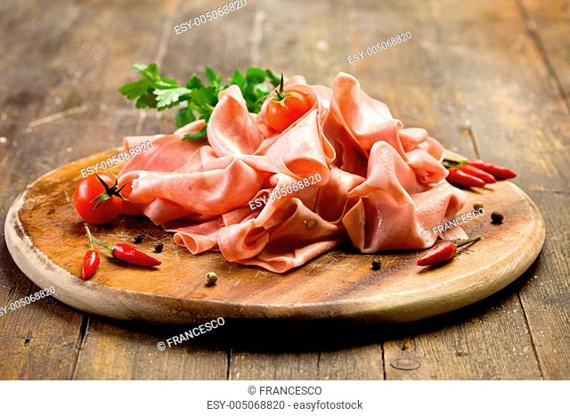 Mortadella slices with red pepper