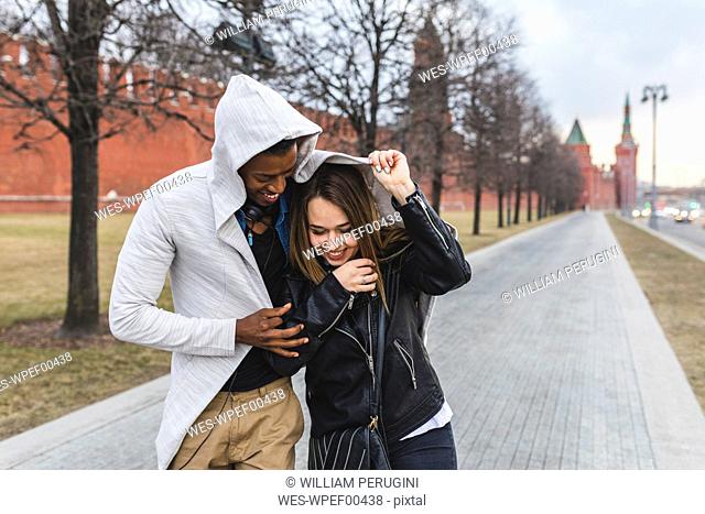 Russia, Moscow, multiracial couple in the city