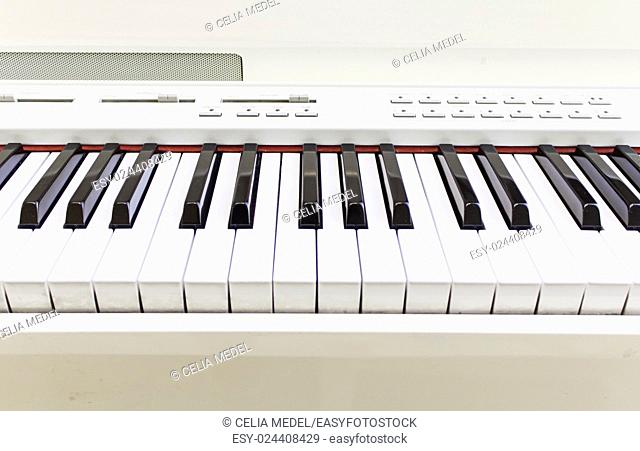 White keyboard electronic piano, musical instrument