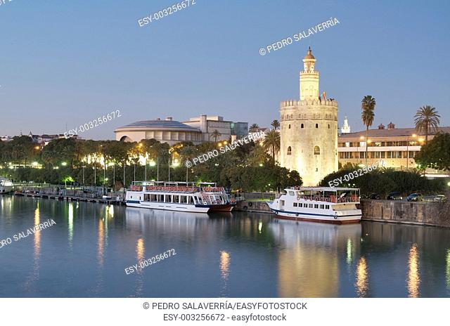 view of the tower of gold on the banks of the Guadalquivir River, Seville, Andalucia, Spain