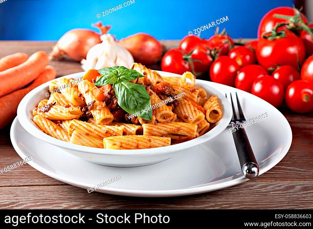 Macaroni Bolognese on a plate. Typical Italian dish. High quality photo