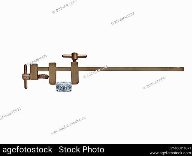 diamond in vintage heavy patina brass clamp over white, clipping path