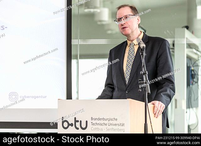 15 December 2023, Brandenburg, Cottbus: Michael Hübner, Vice President of BTU, speaks at the signing of the contract between the Agency for Innovation in...