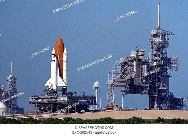 The Space Shuttle Endeavour is being rolled around from Launch Pad 39A to Launch Pad 39B. The rare pad switch was deemed necessary after contamination was...