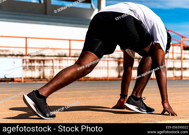 Asian young athlete sport runner black man active ready to start running training at the outdoor on the treadmill for a step forward, healthy exercise workout