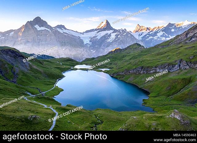 Aerial view of the Bachalpsee lake during a summer sunrise. Grindelwald, Canton of Bern, Switzerland, Europe