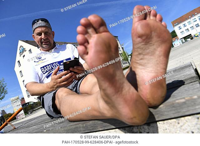 Aldo Berti prepares for his attempt at breaking the world record in barefoot walking in Sassnitz, Â Germany, 28 May 2017