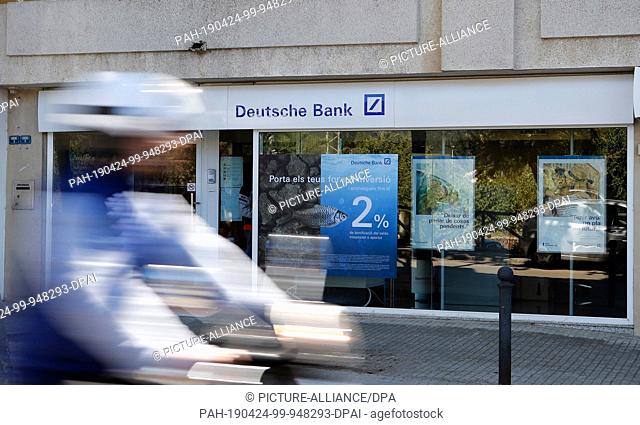 24 April 2019, Spain, Andratx: A branch of Deutsche Bank located on Port d'Andratx, in the southwest of the island of Mallorca. One third of the 13