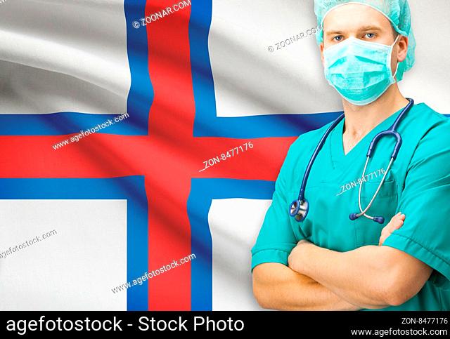 Surgeon with national flag on background - Faroe Islands