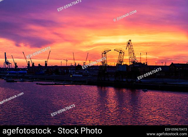 Old cranes in Szczecin at sunrise. Szczecin, West Pomeranian, Poland