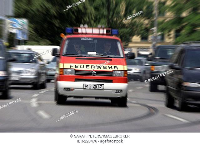 Driving fire engine, Munich, Upper Bavaria, Bavaria, Germany