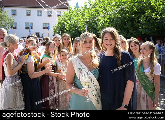 10 September 2023, Saxony-Anhalt, Freyburg: Lea Blumenthal (front, l), the 53rd Saale-Unstrut Regional Wine Queen 2023/24