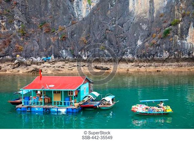 Floating village in a bay, Ha Long Bay, Quang Ninh Province, Vietnam