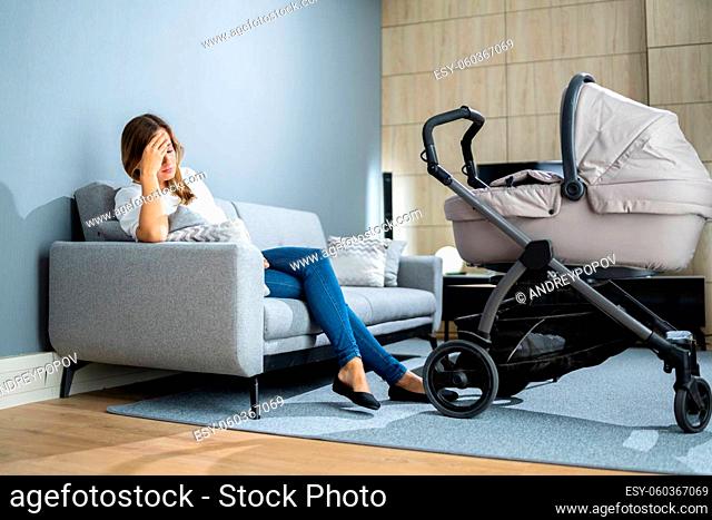 Depressed Unhappy Woman With Newborn. Frustrated Mum