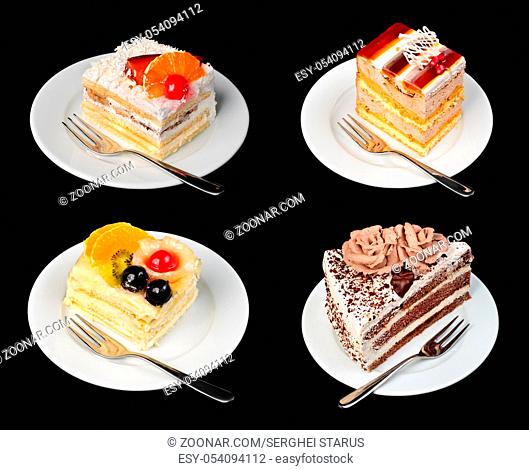 Cakes on plates with forks isolated on black