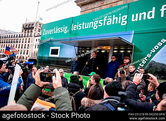 18 December 2023, Berlin: Farmers take part in a demonstration organized by the German Farmers' Association under the slogan ""Too much is too much! Now it's...