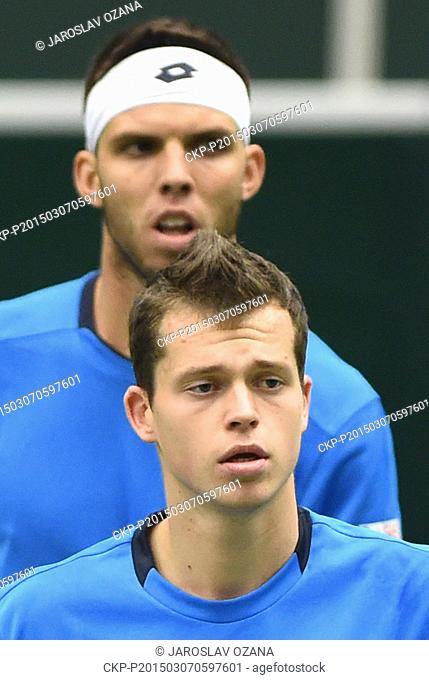 Adam Pavlasek (front) and his partner Jiri Vesely pictured during the Davis Cup World Group first round doubles tennis match against Samuel Groth and Lleyton...