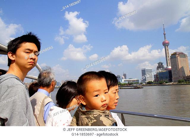 China, Shanghai, Huangpu River, Jinling East Road Dongchang Road Ferry, passengers, Asian, grandmother, woman, man, boy, grandson, holding, deck