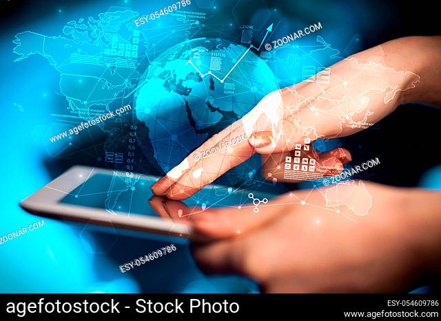 Hand using tablet with multinational worldwide estate report concept