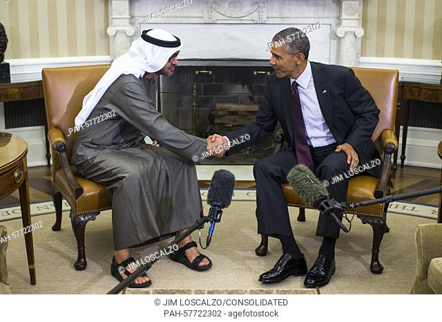 US President Barack Obama (R) greets Crown Prince Mohammed Bin Zayed Al Nahyan (L) of the United Arab Emirates in the Oval Office of the White House in...