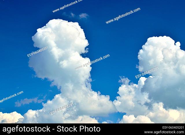 White Cumulus clouds against blue sky closeup
