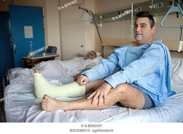 Photo essay from La Croix Saint-Simon Hospital, Paris, France. Department of orthopedics. Patient with a resin plaster following a fracture of the ankle