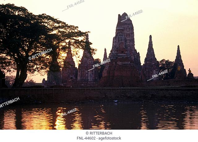 Silhouette of stupas at waterfront, Wat Chai Wattanaram, Ayutthaya, Thailand
