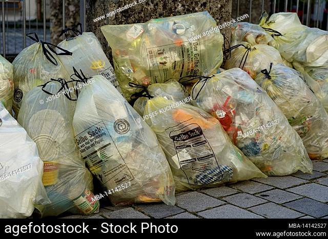 germany, bavaria, altötting district, waste separation, yellow bags on the roadside, before collection