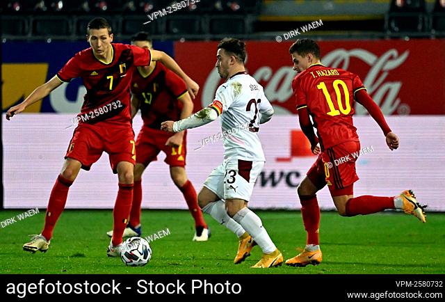 Swiss Xherdan Shaqiri and Belgium's Thorgan Hazard pictured in action during a friendly soccer game between the Belgian national team Red Devils and Switzerland