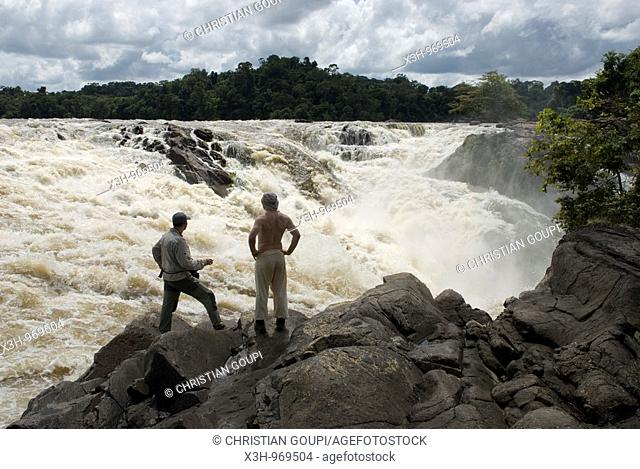 men looking at Para falls on Caura river, state of Bolivar, Bolivarian Republic of Venezuela, South America