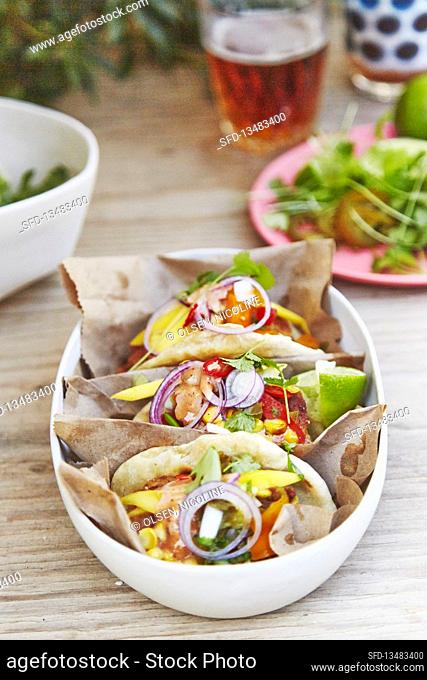 Fish tacos with mango, chilli and coriander