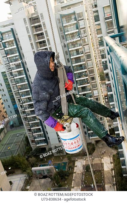 Cleaning the windows of highrises in China