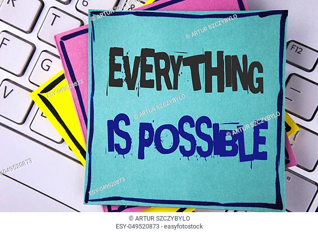 Handwriting text writing Everything Is Possible. Concept meaning All you think or dream can become true Optimistic written Sticky note paper placed Laptop...
