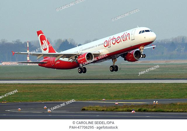 An aircraft of the German airline Air Berlin takes off at the airport in Duesseldorf, Germany, 30 March 2014. Photo: Caroline Seidel/dpa | usage worldwide