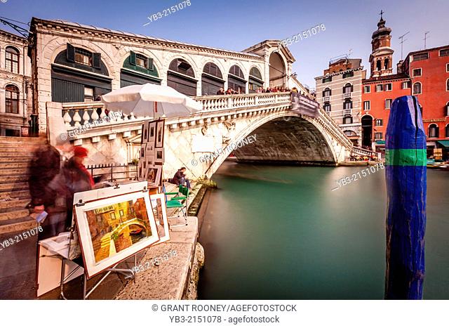 Local Artist Selling Paintings By The Rialto Bridge, Venice, Italy