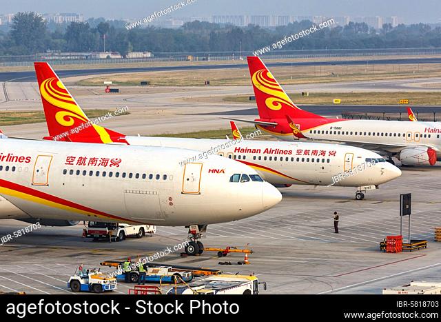 An Airbus A330-300 aircraft of Hainan Airlines with registration number B-8015 at Beijing Airport (PEK), Beijing, China, Asia
