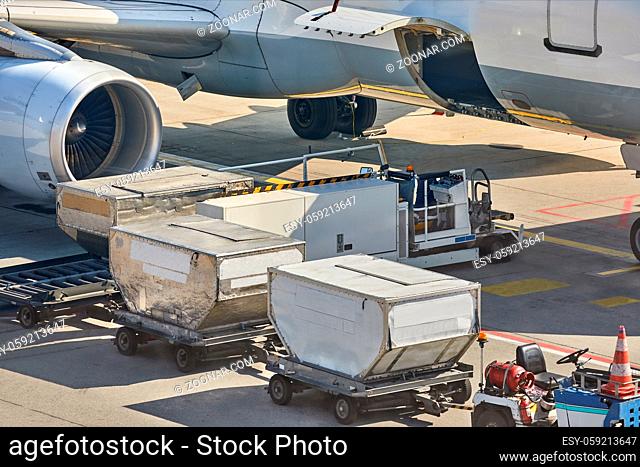 Cargo containers loaded into an airliner
