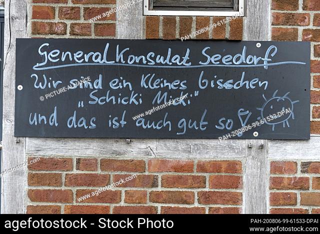 02 August 2020, Mecklenburg-Western Pomerania, Seedorf: On a sign at the harbour it says: ""We're a little bit chicky Micki and that's good!"" Seedorf is a...