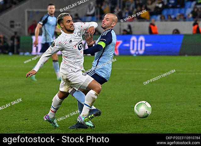 Adam Ounas of Lille and fouling Vladimir Weiss of Bratislava in action during the Football European Conference League 4th round match Slovan Bratislava vs