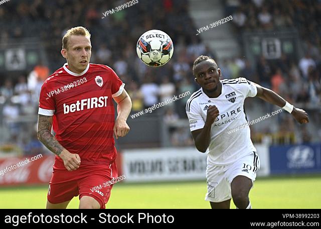 Antwerp's Ritchie De Laet and Eupen's Regan Charles-Cook fight for the ball during a soccer match between KAS Eupen and Royal Antwerp FC RAFC